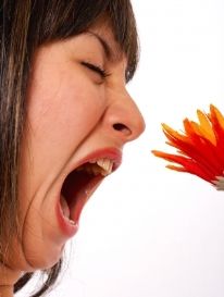 Woman Sneezing